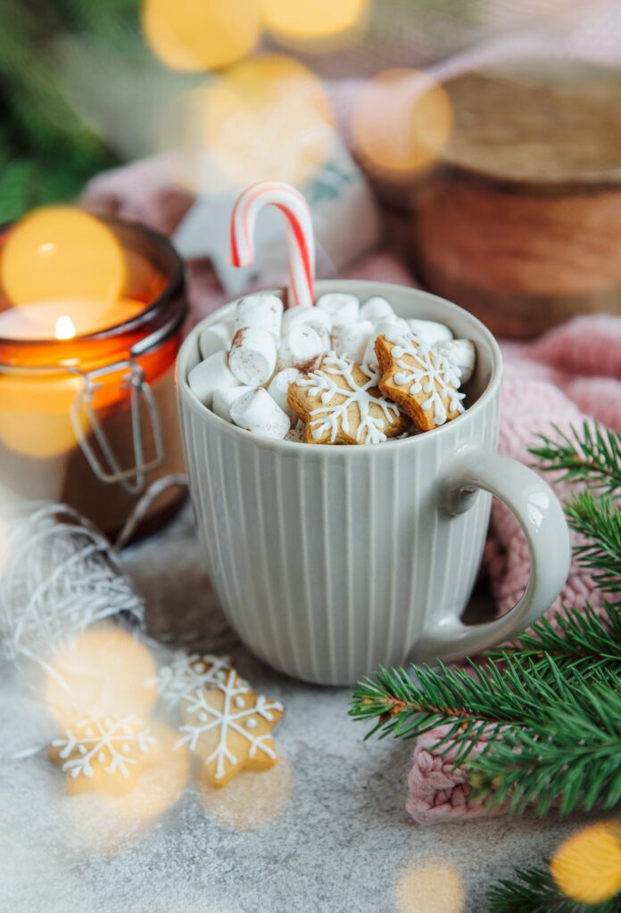 Cozy winter and Christmas setting with hot cocoa and homemade cookies
